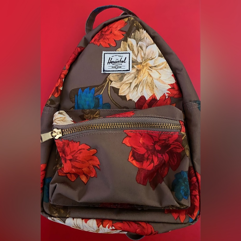 Herschel mini backpack 
And mini purse with flowers.